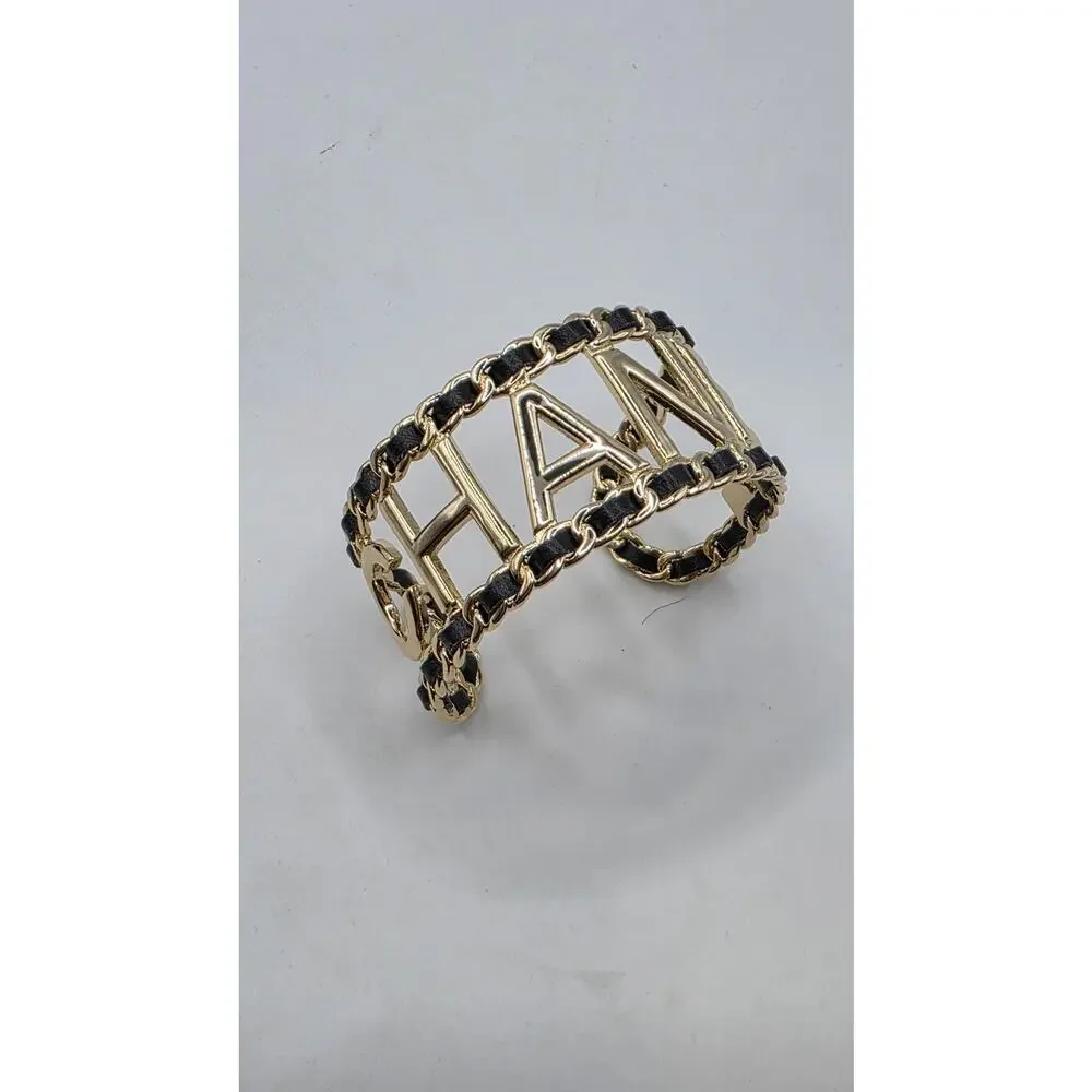 Chanel Gold-tone Leather 'CHANEL' Cuff Bracelet